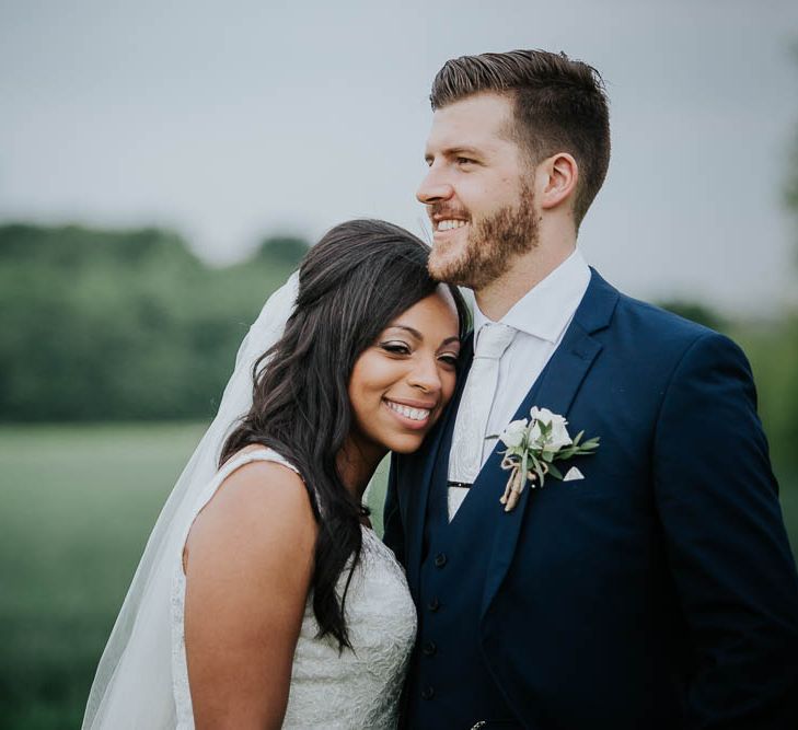 Bride in Mori Lee Gown | Groom in Ted Baker Suit from Moss Bros | Cooling Castle Barn Wedding | Michelle Cordner Photography