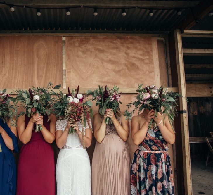 Bridesmaids in Different Dresses | Bride in Lenora Watters Wtoo Gown | Bohemian Tipi Wedding Weekend at Fforest, Wales | Naomi Jane Photography