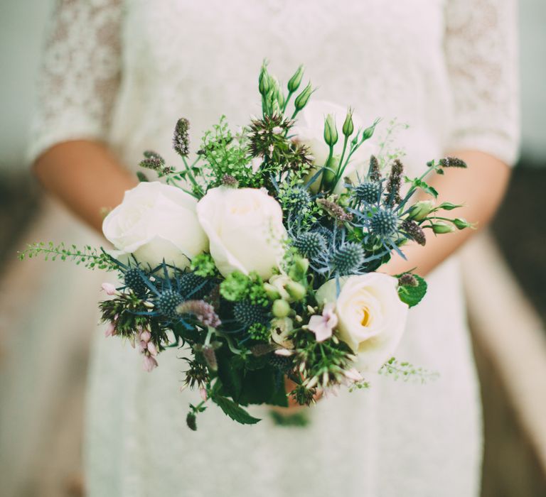 Wedding Bouquet With Blue Thistles And White Blooms