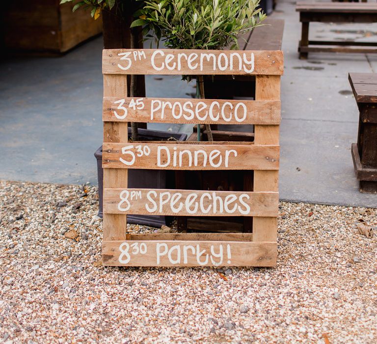 Wooden Pallet Order of the Day Sign | Country Wedding at Gorwell Farm, Dorset | Steph Newton Photography