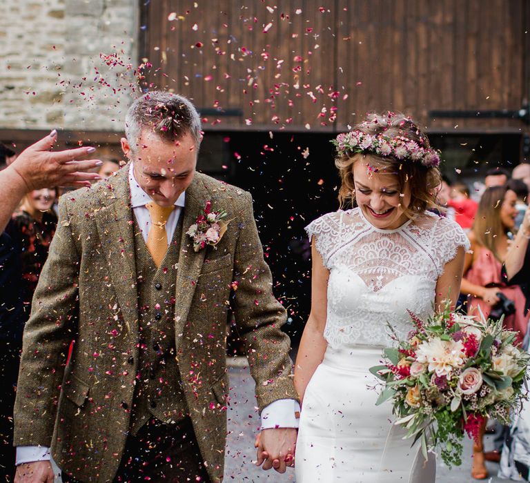 Confetti Exit | Bride in Flower Crown & Catherine Deane Separates | Groom in Harris Tweed | Country Wedding at Gorwell Farm, Dorset | Steph Newton Photography