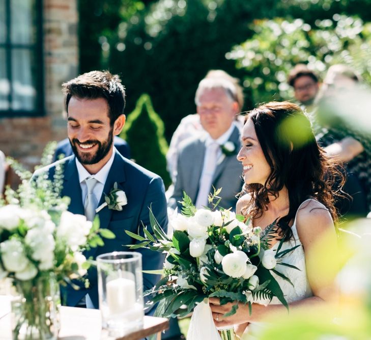 Wedding Ceremony | Sarah Seven Wedding Dress | Navy Paul Smith Suit | Outdoor Intimate Wedding at Casa Cornacchi in Tuscany, Italy | Dale Weeks Photography