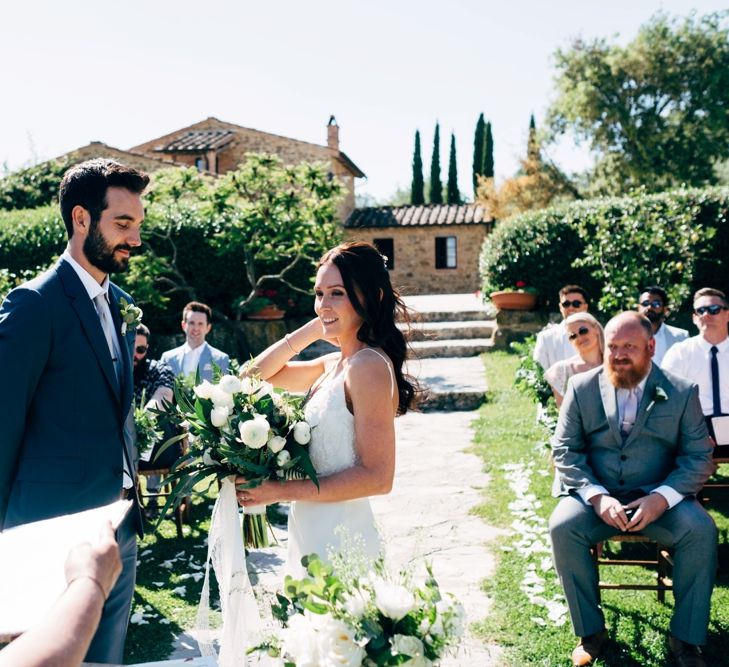 Wedding Ceremony | Sarah Seven Wedding Dress | Navy Paul Smith Suit | Outdoor Intimate Wedding at Casa Cornacchi in Tuscany, Italy | Dale Weeks Photography