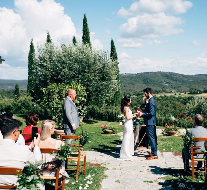 Wedding Ceremony | Sarah Seven Wedding Dress | Navy Paul Smith Suit | Outdoor Intimate Wedding at Casa Cornacchi in Tuscany, Italy | Dale Weeks Photography