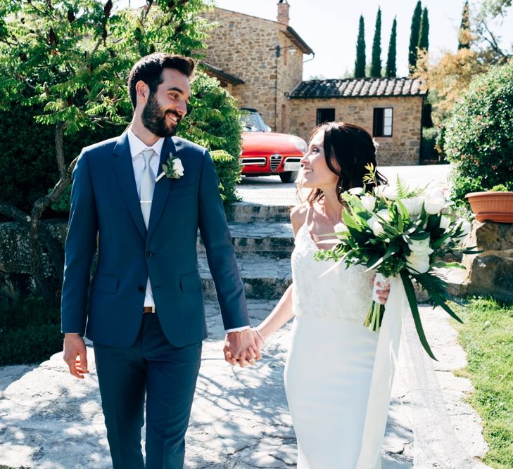 Wedding Ceremony | Sarah Seven Wedding Dress | Navy Paul Smith Suit | Outdoor Intimate Wedding at Casa Cornacchi in Tuscany, Italy | Dale Weeks Photography