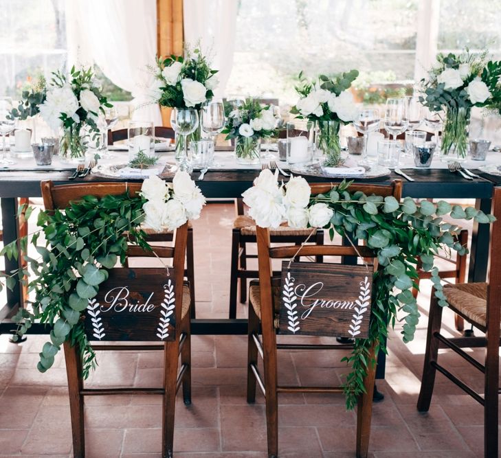 Chair Back Decor | Table Scape | White Floral Centrepieces | Outdoor Intimate Wedding at Casa Cornacchi in Tuscany, Italy | Dale Weeks Photography