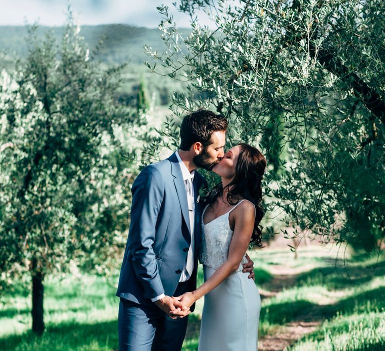 Bride in Sarah Seven Wedding Dress | Groom in Navy Paul Smith Suit | Outdoor Intimate Wedding at Casa Cornacchi in Tuscany, Italy | Dale Weeks Photography