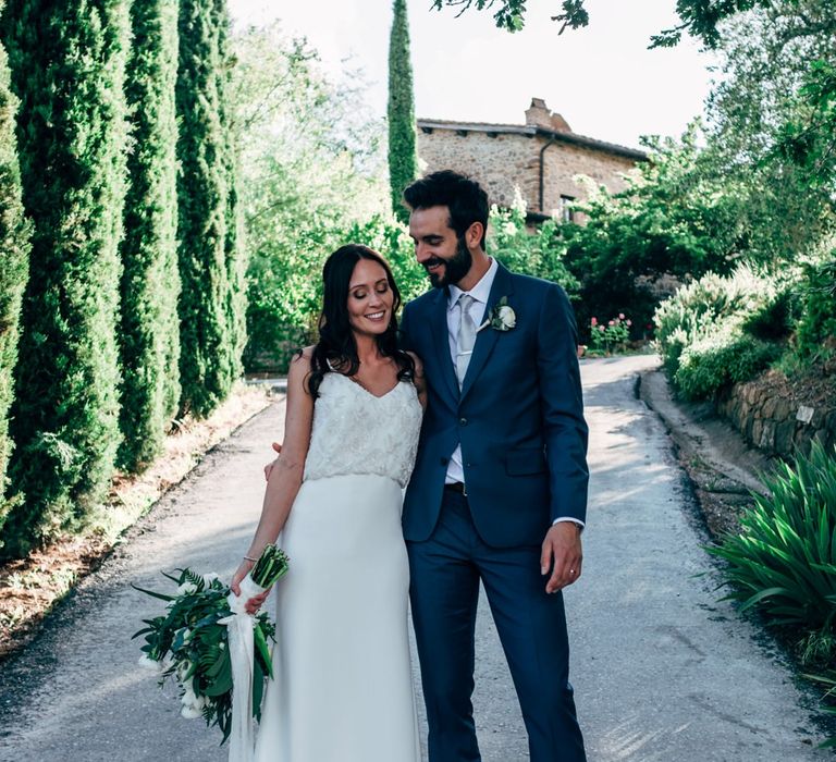 Bride in Sarah Seven Wedding Dress | Groom in Navy Paul Smith Suit | Outdoor Intimate Wedding at Casa Cornacchi in Tuscany, Italy | Dale Weeks Photography