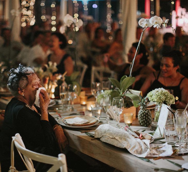 Incredible Outdoor Wedding Reception In Bali With Hanging Florals & Fairy Lights