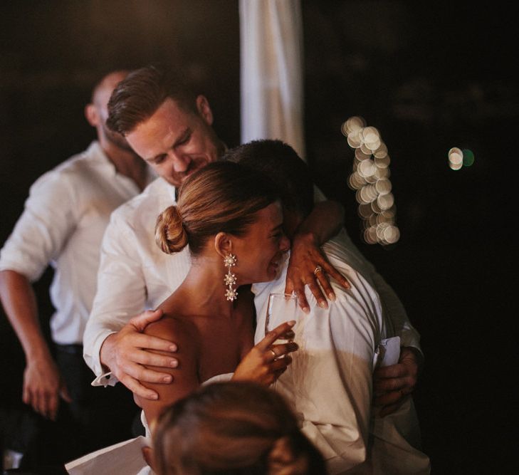 Incredible Outdoor Wedding Reception In Bali With Hanging Florals & Fairy Lights