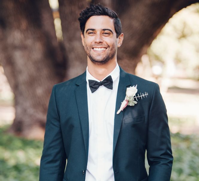 Groom in Tuxedo & Bow Tie