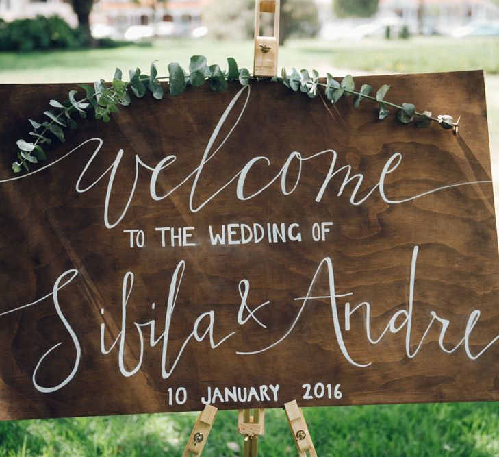 Wooden Welcome Sign with Eucalyptus Garland