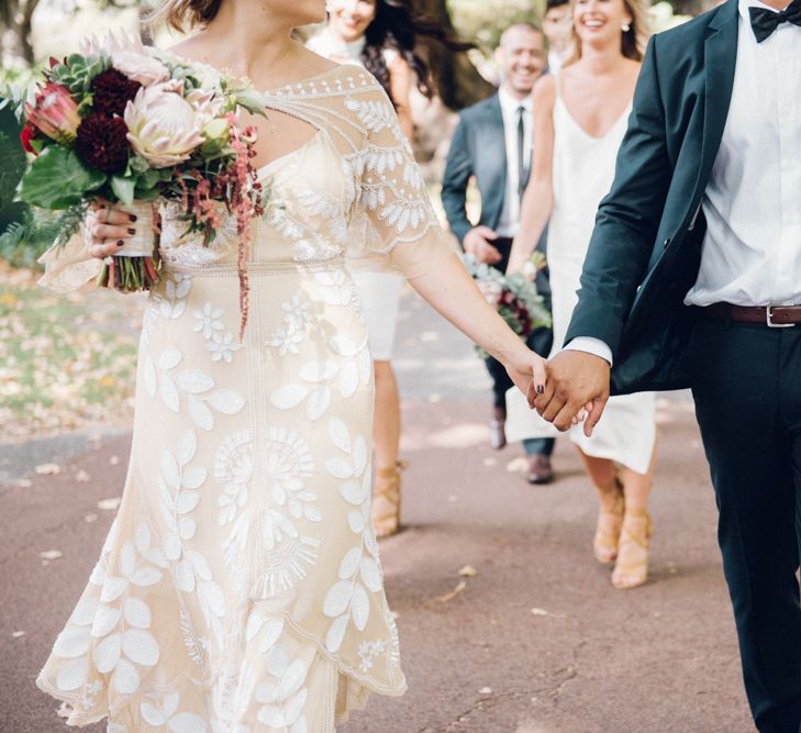 Bride & Groom Holding Hands