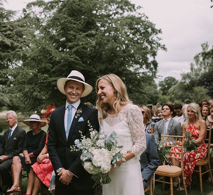 Wedding Ceremony | Bride in a Laure de Sagazan Gown | Groom in Navy Suit | Blue & White Outdoor Summer Wedding at Maunsel House, Somerset | Maureen Du Preez Photography