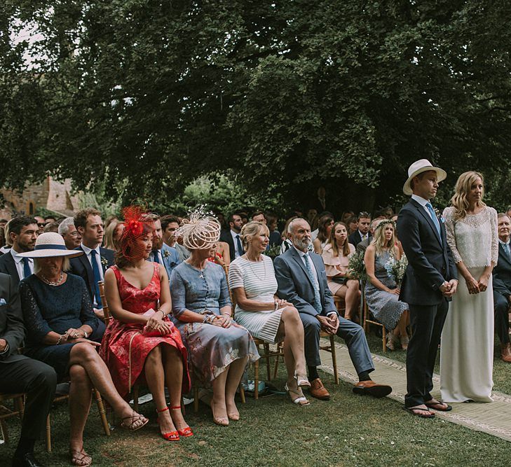 Wedding Ceremony | Bride in a Laure de Sagazan Gown | Groom in Navy Suit | Blue & White Outdoor Summer Wedding at Maunsel House, Somerset | Maureen Du Preez Photography