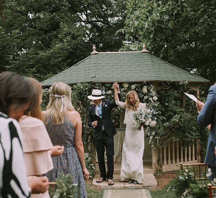 Wedding Ceremony | Bride in a Laure de Sagazan Gown | Groom in Navy Suit | Blue & White Outdoor Summer Wedding at Maunsel House, Somerset | Maureen Du Preez Photography