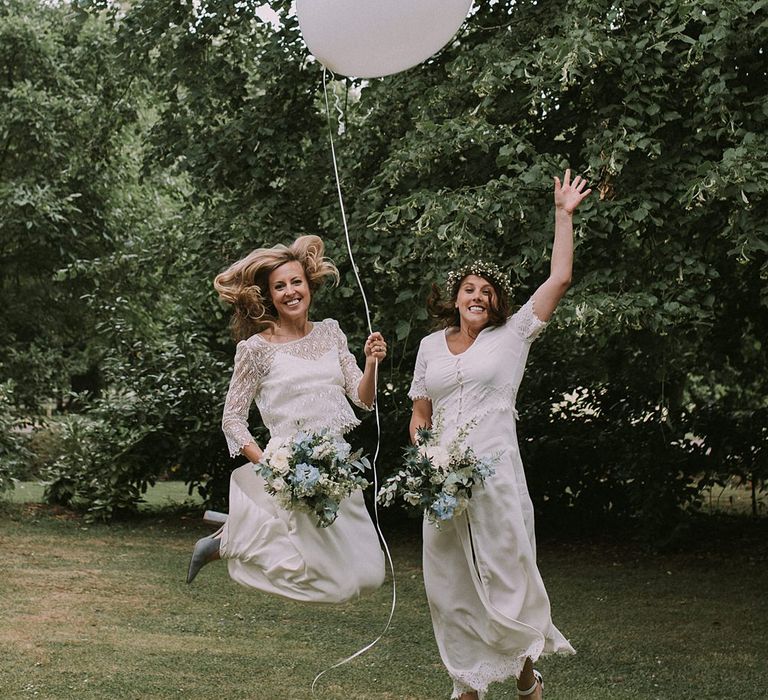 Bride in Laure du Sagazan Gown | Bridesmaid in White Dress | Blue & White Outdoor Summer Wedding at Maunsel House, Somerset | Maureen Du Preez Photography