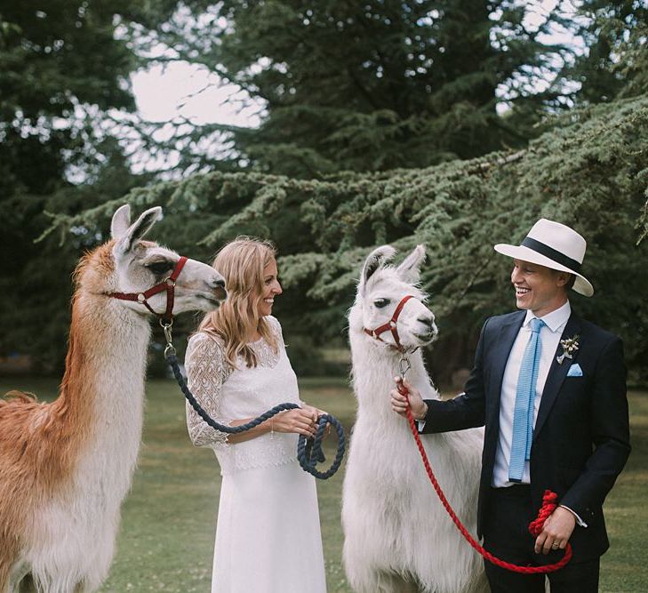 Bride in Laure du Sagazan Gown | Groom in Panama Hat | Llamas | Blue & White Outdoor Summer Wedding at Maunsel House, Somerset | Maureen Du Preez Photography