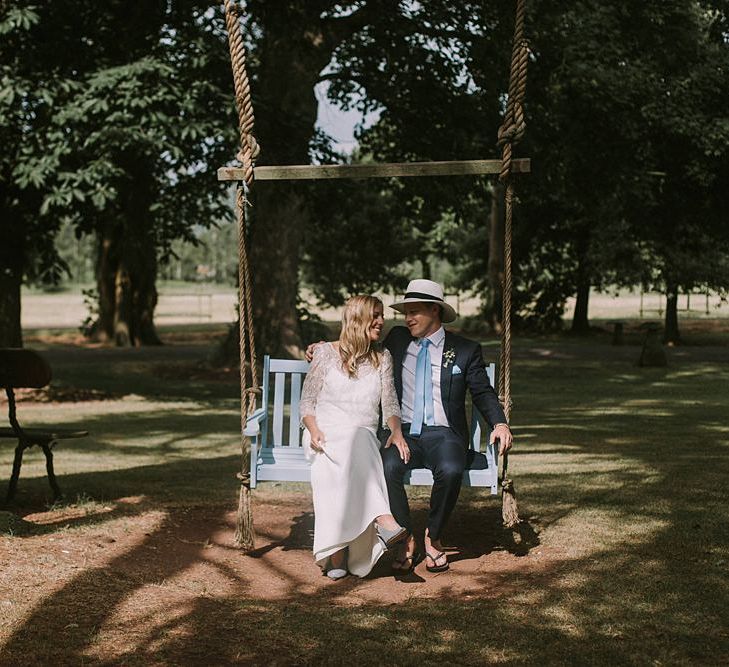 Bride in Laure du Sagazan Gown | Groom in Panama Hat | Blue & White Outdoor Summer Wedding at Maunsel House, Somerset | Maureen Du Preez Photography