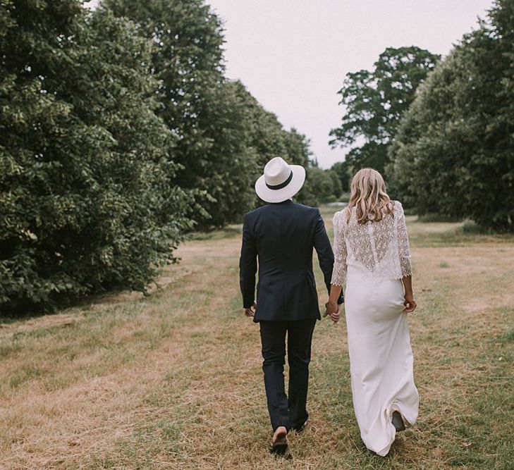 Bride in Laure du Sagazan Gown | Groom in Panama Hat | Blue & White Outdoor Summer Wedding at Maunsel House, Somerset | Maureen Du Preez Photography