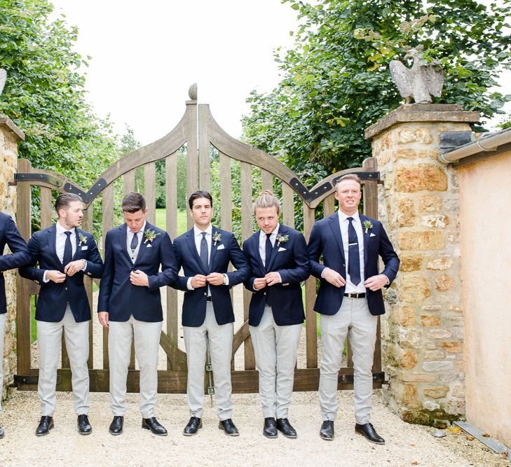 Groom & Groomsmen In Navy Jackets With Pale Grey Chinos // Yolan Cris Bride For A Stylish Boho Wedding At Axnoller Dorset Floral Arch Jennifer Poynter With Images From Lydia Stamps Photography