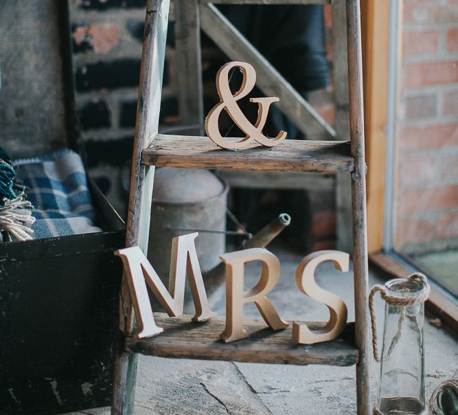 Rustic Autumn Wedding At Barmbyfields Barn With Bride In Ellis Bridal Tea Length Dress & Flowers By Number 27 Floral Design With Images From Emma Maddocks Photography