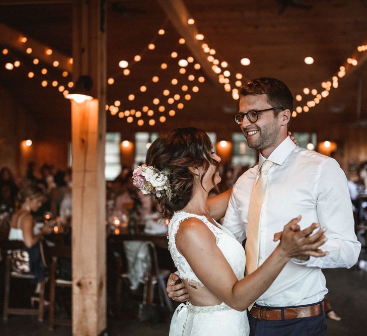 First Dance | Festoon Lights | Bride in Lace Venus Bridal Gown | Groom in Ted Baker Suit | Outdoor Wedding at Claxton Farm in Weaverville, North Carolina | Benjamin Wheeler Photography