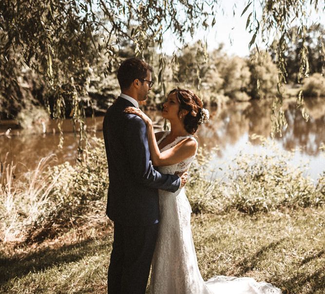 First Look | Bride in Lace Venus Bridal Gown | Groom in Ted Baker Suit | Outdoor Wedding at Claxton Farm in Weaverville, North Carolina | Benjamin Wheeler Photography