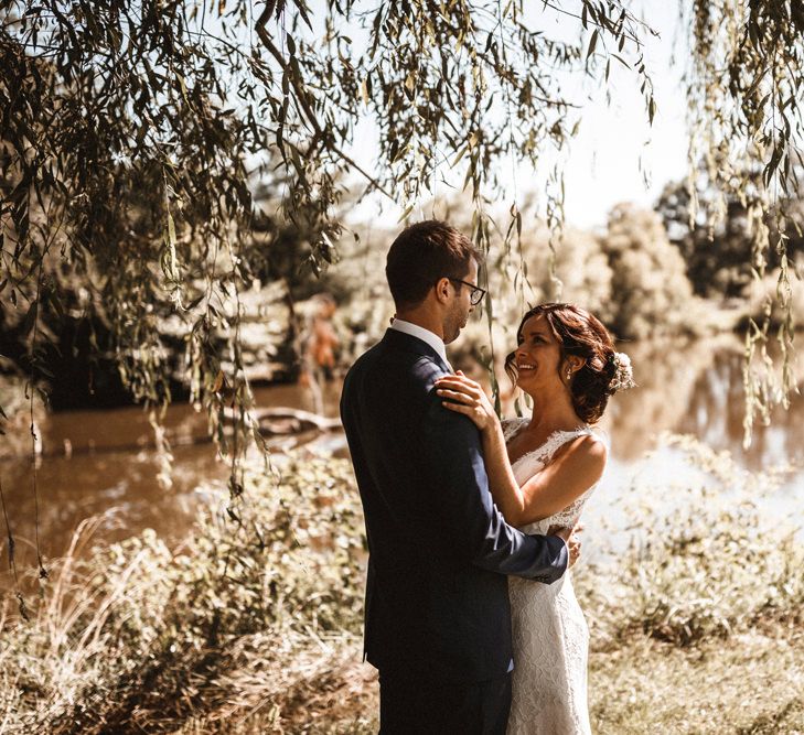 First Look | Bride in Lace Venus Bridal Gown | Groom in Ted Baker Suit | Outdoor Wedding at Claxton Farm in Weaverville, North Carolina | Benjamin Wheeler Photography