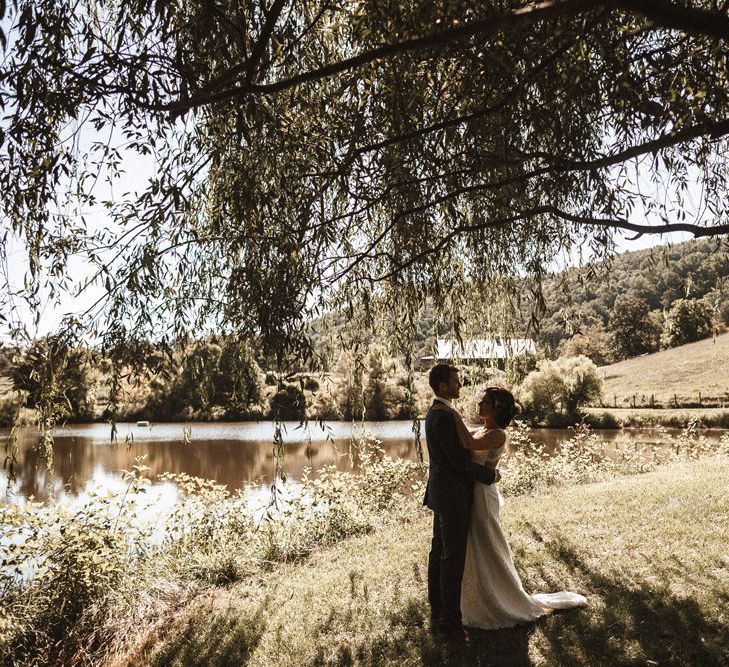 Bride in Venus Bridal Gown | Groom in Ted Baker Suit | Outdoor Wedding at Claxton Farm in Weaverville, North Carolina | Benjamin Wheeler Photography