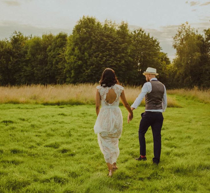 Intimate Garden Party Wedding at The Parsonage in The Cotswolds. Bride in Tatyana Merenyuk with Photography by Claudia Rose Carter.