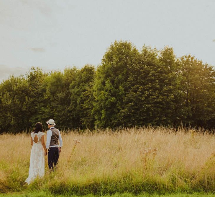 Intimate Garden Party Wedding at The Parsonage in The Cotswolds. Bride in Tatyana Merenyuk with Photography by Claudia Rose Carter.