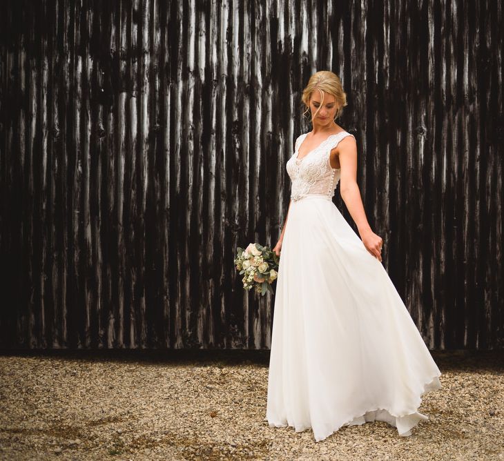 Bride in Flora 'Madlen' Wedding Dress from Blackburn Bridal Boutique