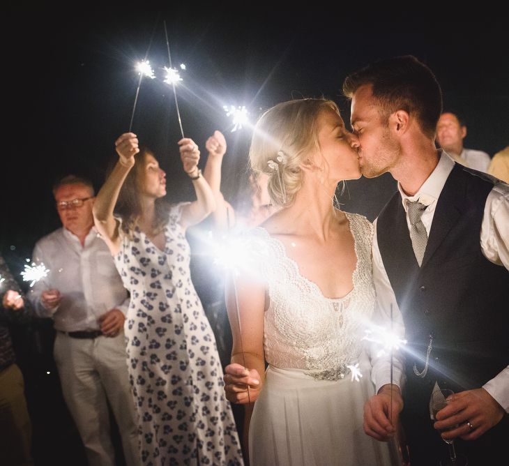 Sparkler Exit with Bride in Flora 'Madlen' Wedding Dress from Blackburn Bridal Boutique and Groom in Ted Baker Suit