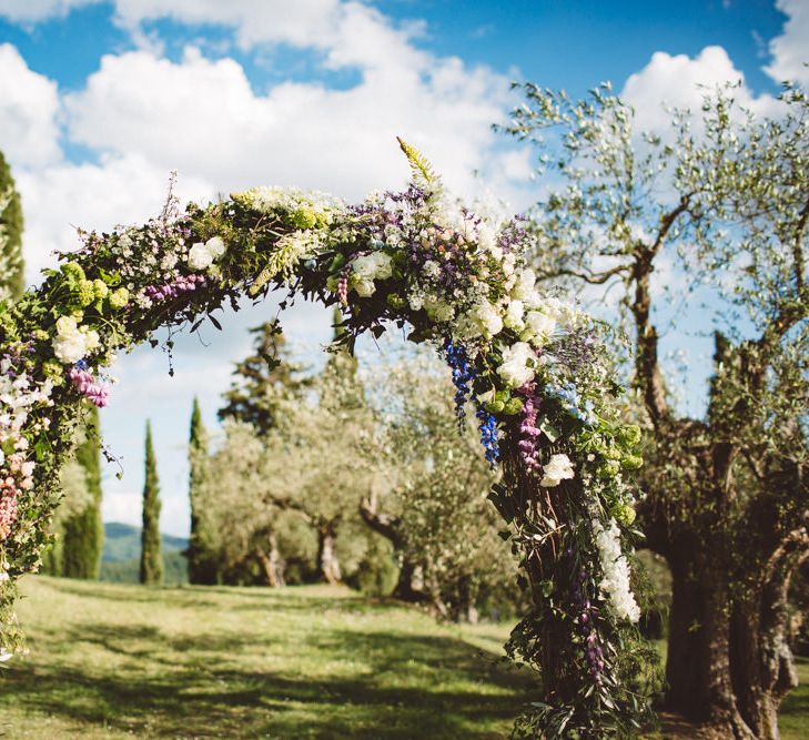 Floral Arch | Outdoor Wedding at Borgo Bastia Creti in Italy | Paolo Ceritano Photography