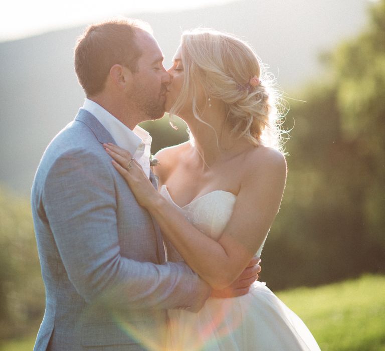 Sunset | Bride in Lyn Ashworth Wedding Dress | Groom in Light Blue Jacket | Outdoor Wedding at Borgo Bastia Creti in Italy | Paolo Ceritano Photography