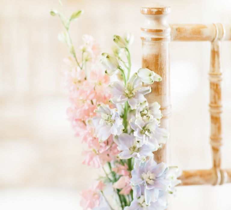 Almonry Barn Exclusive Hire Wedding Venue In Somerset With Pastel Flowers & Fairy Lights Images From Bowtie and Belle Photography With Bride In Wtoo By Watters