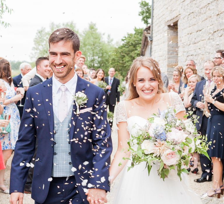 Almonry Barn Exclusive Hire Wedding Venue In Somerset With Pastel Flowers & Fairy Lights Images From Bowtie and Belle Photography With Bride In Wtoo By Watters