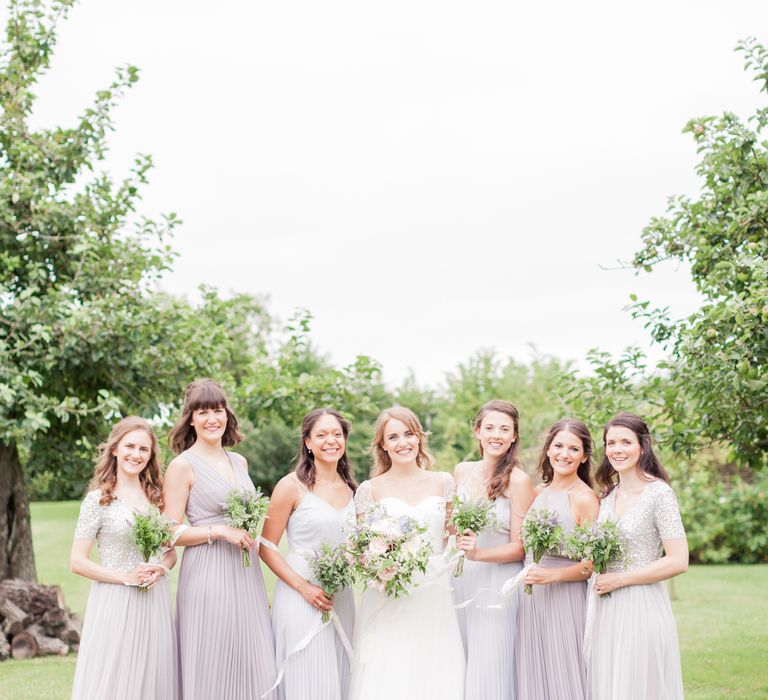 Almonry Barn Exclusive Hire Wedding Venue In Somerset With Pastel Flowers & Fairy Lights Images From Bowtie and Belle Photography With Bride In Wtoo By Watters