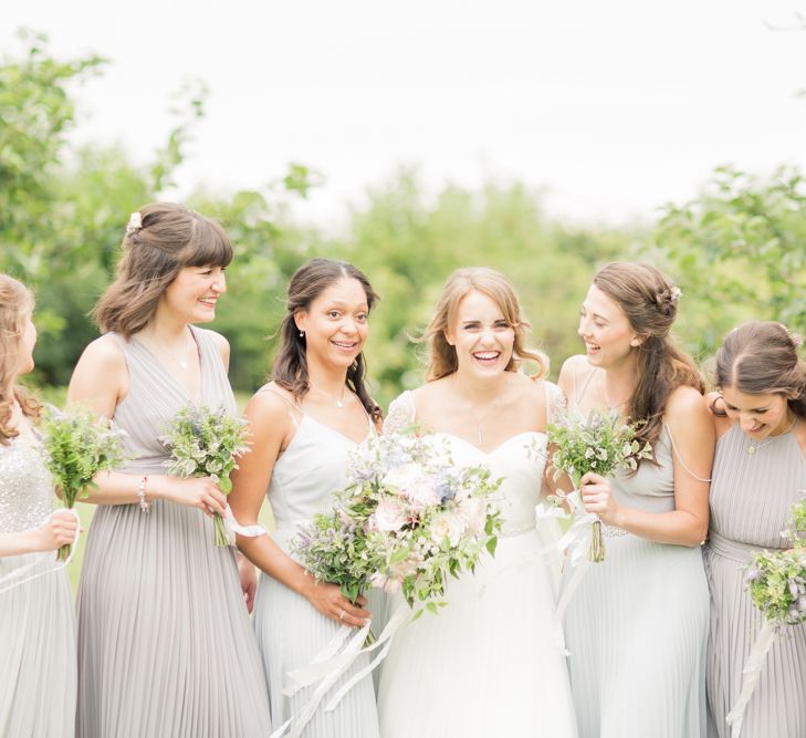 Almonry Barn Exclusive Hire Wedding Venue In Somerset With Pastel Flowers & Fairy Lights Images From Bowtie and Belle Photography With Bride In Wtoo By Watters