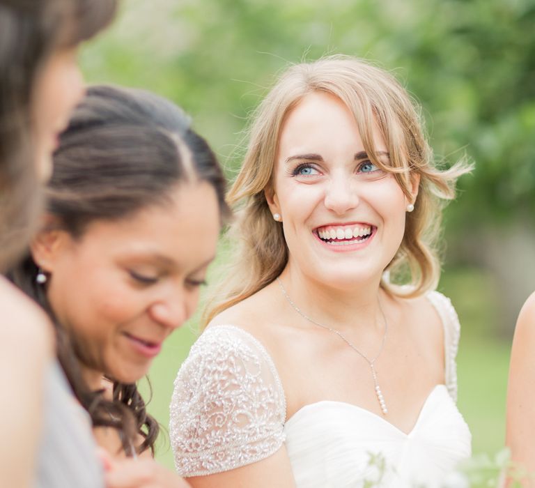 Almonry Barn Exclusive Hire Wedding Venue In Somerset With Pastel Flowers & Fairy Lights Images From Bowtie and Belle Photography With Bride In Wtoo By Watters