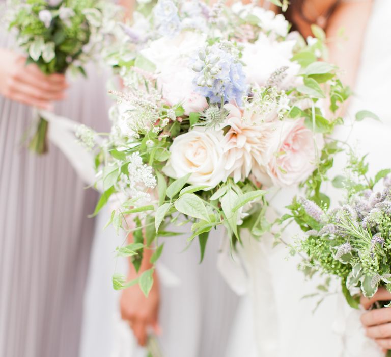 Almonry Barn Exclusive Hire Wedding Venue In Somerset With Pastel Flowers & Fairy Lights Images From Bowtie and Belle Photography With Bride In Wtoo By Watters