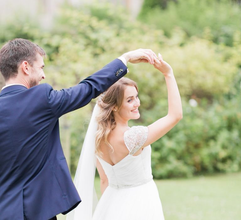 Almonry Barn Exclusive Hire Wedding Venue In Somerset With Pastel Flowers & Fairy Lights Images From Bowtie and Belle Photography With Bride In Wtoo By Watters