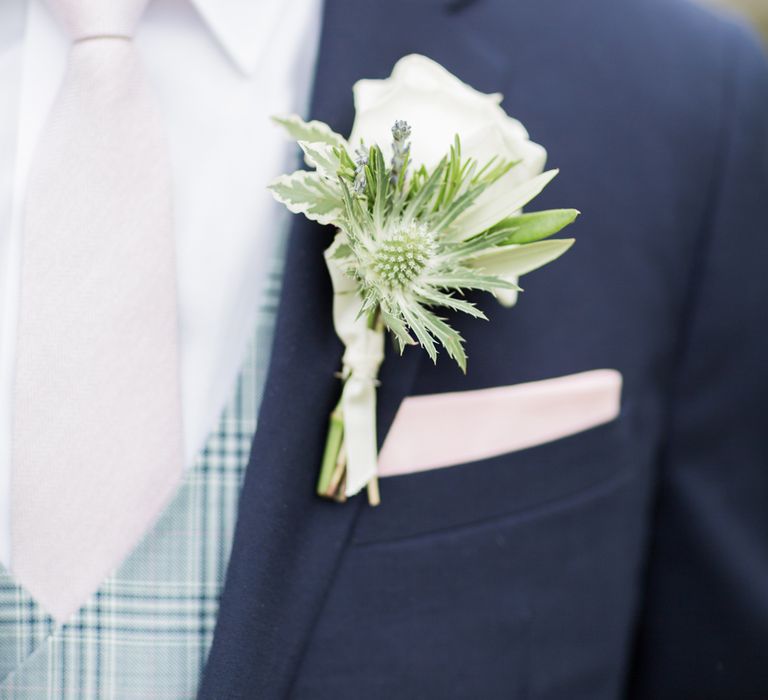 Elegant White Buttonhole For Groom With Navy Suit