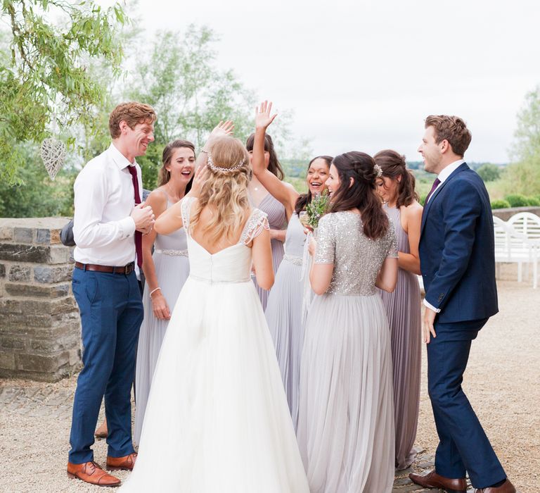 Almonry Barn Exclusive Hire Wedding Venue In Somerset With Pastel Flowers & Fairy Lights Images From Bowtie and Belle Photography With Bride In Wtoo By Watters