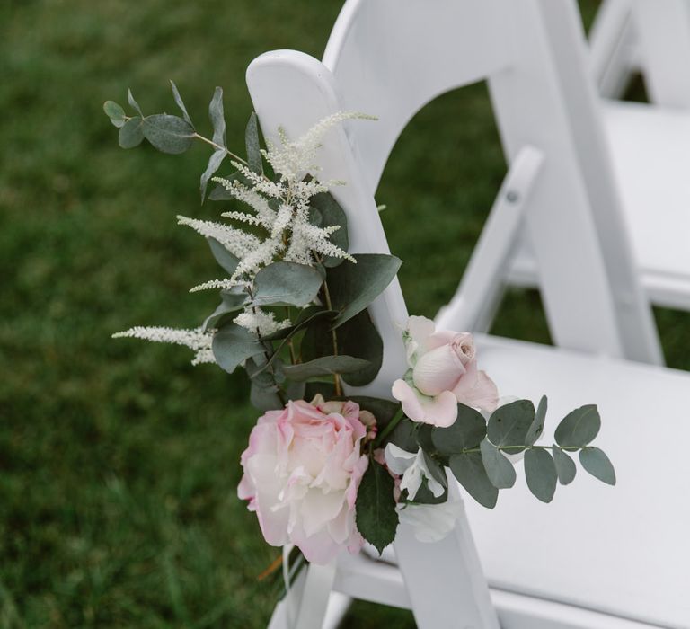 Floral Aisle Chair Back Decor | Elegant Notley Abbey Wedding | Natalie J Weddings Photography