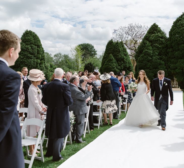 Bridal Entrance in Pronovias Gown | Elegant Notley Abbey Wedding | Natalie J Weddings Photography