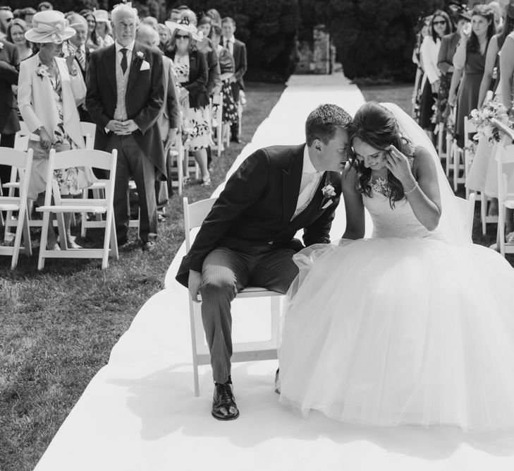 Wedding Ceremony | Bride in Pronovias | Groom in Moss Bros | Elegant Notley Abbey Wedding | Natalie J Weddings Photography