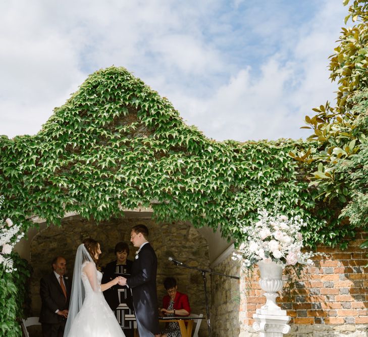 Outdoor Wedding Ceremony | Bride in Pronovias | Groom in Moss Bros Suit | Elegant Notley Abbey Wedding | Natalie J Weddings Photography