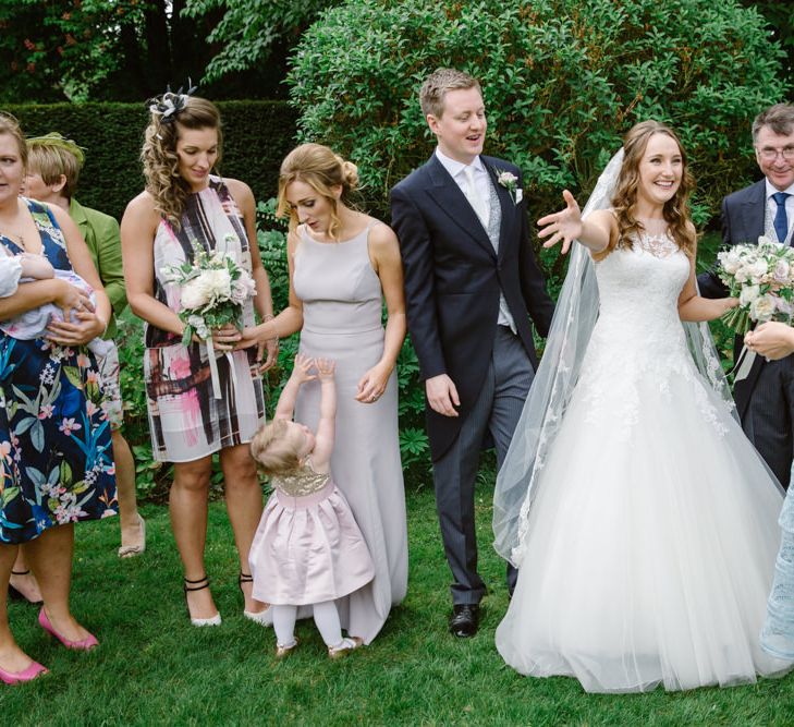 Bride in Pronovias | Groom in Moss Bros Suit | Elegant Notley Abbey Wedding | Natalie J Weddings Photography